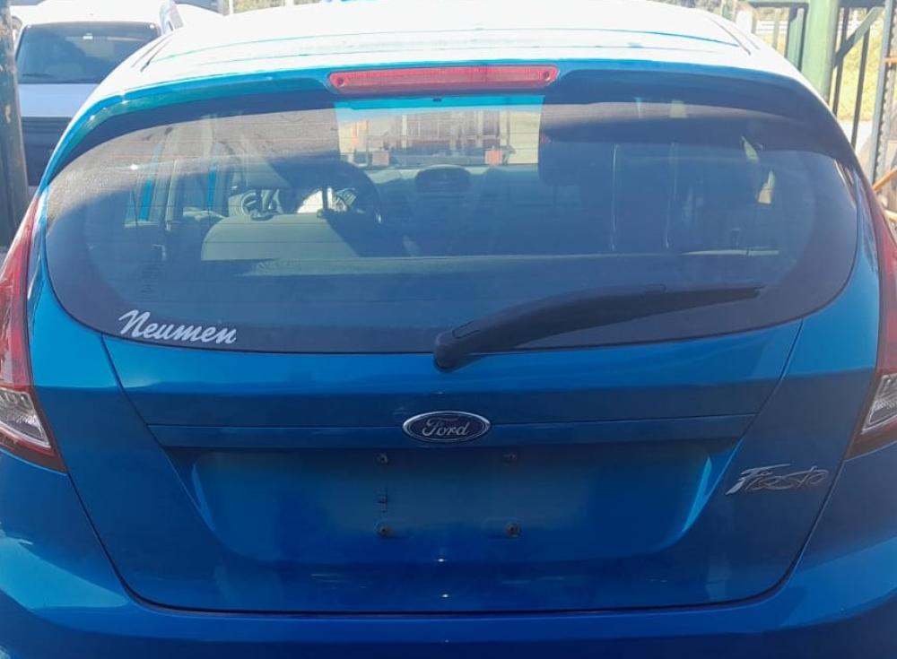 PORTON TRASERO FORD FIESTA 1.6L SE.